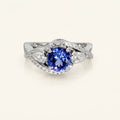 Tanzanite Moissanite Crossover Engagement Ring