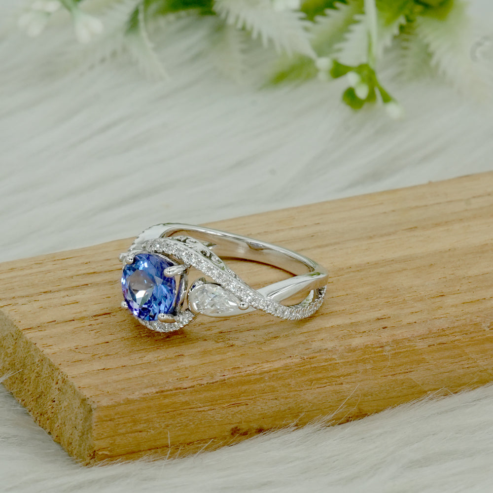 Tanzanite Moissanite Crossover Engagement Ring