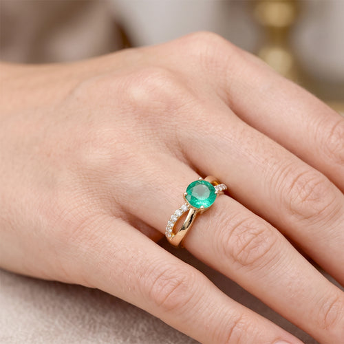 Emerald & Moissanite Crossover Engagement Ring